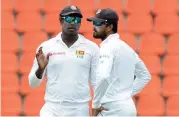  ??  ?? Sri Lanka‘s Angelo Mathews (left) and Dinesh Chandimal all set to return