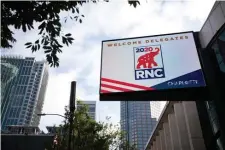  ?? GETTY IMAGES ?? READY TO GO: Signs for the 2020 Republican National Convention appear outside of the Charlotte Convention Center in Charlotte, N.C., on Saturday.