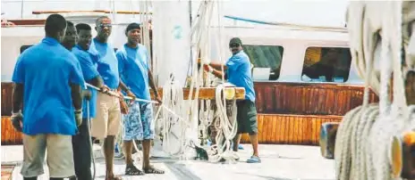  ??  ?? With the help of one of the crewmen, Garrison was able to conquer her fear of water