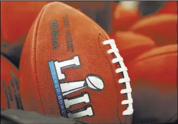  ?? Rick Osentoski The Associated Press ?? Official balls for Super Bowl LII at the Wilson Sporting Goods Co. in Ada, Ohio.