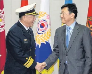  ?? EPA ?? Chinese Guan You Fei, left, director-general for Internatio­nal Affairs, talks with South Korean Yoon Soon-gu, right, director-general for Internatio­nal Policy of Defence prior their meeting at the Defence Ministry in Seoul.