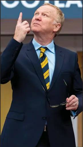  ??  ?? SFA president Alan McRae (above, left) bumbled his way through the unveiling of new Scotland manager Alex McLeish on Friday morning