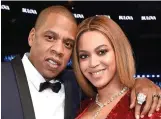  ??  ?? Sticking together: Jay-Z and Beyonce