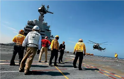  ?? PHOTO: REUTERS ?? President Donald Trump arrives on the Marine One helicopter aboard the deck of the aircraft carrier USS Gerald R. Ford for its commission­ing ceremony at Naval Station Norfolk, Virginia.