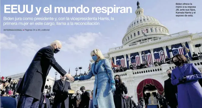  ?? ANDREW HARNIK / REUTERS ?? Biden ofrece la mano a su esposa Jill, ante sus hijos, Kamala Harris y el esposo de esta.