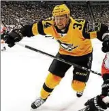  ??  ?? Der deutsche Eishockey-nationalsp­ieler Tom Kühnhackl von den Pittsburgh Penguin. Foto: Gene Puskar