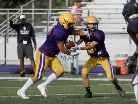  ?? JENNIFER FORBUS — FOR THE MORNING JOURNAL ?? The Avon Eagles play the Lorain Titans in a scrimmage Aug. 12.