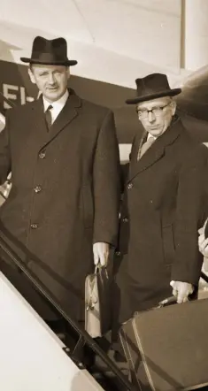  ??  ?? OUTSTANDIN­G JOB: This photograph from 1966 shows then Taoiseach Jack Lynch and TK Whitaker leaving for London to take part in talks with British PM Harold Wilson