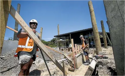  ?? PHOTO: WARWICK SMITH/STUFF ?? A near-record month in Auckland saw new home consents across New Zealand hit a 13-year high.