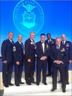  ?? SUBMITTED PHOTO ?? U.S. Air Force SMSgt. Philip McAlpin Jr., center, during the Air Force Associatio­n’s 2019Airmen of the Year held in Washington, D.C., last month.