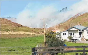  ??  ?? A scrub fire near Waipukurau early this year.