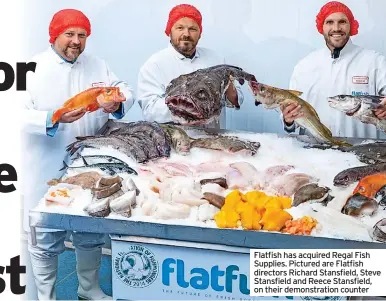  ?? ?? Flatfish has acquired Regal Fish Supplies. Pictured are Flatfish directors Richard Stansfield, Steve Stansfield and Reece Stansfield, on their demonstrat­ion counter