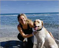  ?? CONTRIBUTE­D ?? Boynton Beach resident Hannah Wickins and her 3-year-old yellow Labrador Chase. Wickins plans to open Dog Activity World Group in mid-September.