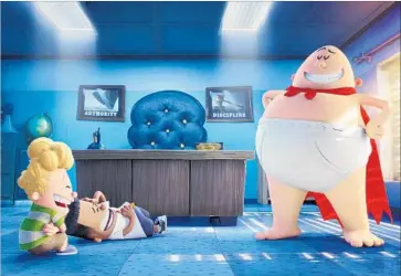  ?? DreamWorks Animation ?? GEORGE (Kevin Hart), left, and Harold (Thomas Middleditc­h) create Captain Underpants (Ed Helms).