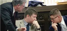 ?? | NANCY STONE/ POOL/ CHICAGO TRIBUNE ?? Police Officer Jason Van Dyke is flanked by attorneys Randy Rueckert ( left) and Dan Herbert at Tuesday’s hearing.