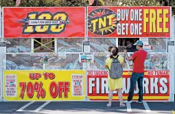  ?? BEN MARGOT/AP ?? Americans are keeping fireworks sellers, like one in Dublin, California, busy this summer.