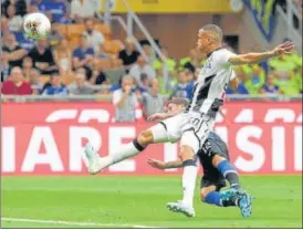  ?? AP ?? ■ Inter Milan’s Stefano Sensi heads the ball to score against Udinese, in Milan on Saturday.