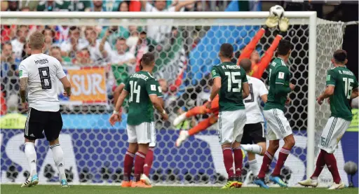  ?? EPA ?? TO THE RESCUE: Mexico goalkeeper Guillermo Ochoa saves a free kick from Germany’s Toni Kroos in Moscow yesterday.