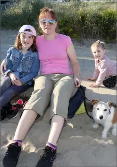  ??  ?? Emma, Debbie and Elizebeth Cooney, Enniscorth­y, and family pet ‘Rebel’.