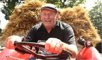  ?? PHOTO: DAMIEN EAGERS ?? Tommy Farrell from Moynalty driving his Massey Ferguson 35 tractor at the Moynalty Steam Threshing Festival in Co Meath