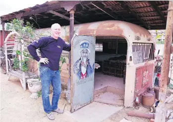  ?? JIM BYERS ?? Richard Beck from Hotel Temecula shows off what used to be the old town jail. The hotel’s backyard is filled with all sorts of odd treasures and pieces of Temecula history, as it was first built in 1891.