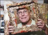  ?? DAMIAN DOVARGANES/AP ?? This Oct. 29, 2009 file photo shows Father Bill Moore with one of his pieces of art in his studio at the Pomona Arts Colony in Pomona, Calif.