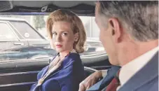  ?? AMC ?? Henry (Christophe­r Stanley) finds himself on the receiving end of one of Betty’s (Jones) trademark icy stares on Mad Men.