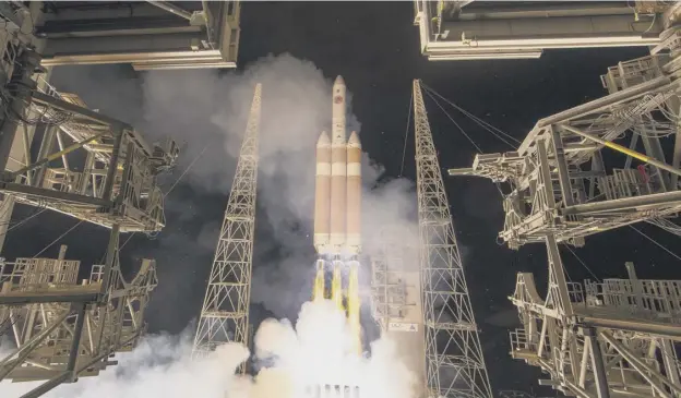  ?? PICTURE: AFP ?? 0 The Delta IV heavy rocket is launched from Cape Canaveral in Florida yesterday on its mission to carry the Parker solar probe towards the sun