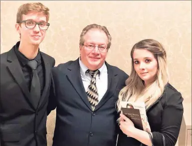  ?? Contribute­d photo s/ Alyssa Broe ?? Michael Krystek, left, and Sara Estela of New Britain were wed Saturday at Middlesex Hospital at the ICU bedside of her father, Juan Estela, center, who died Monday.