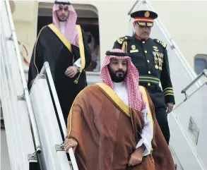  ?? G20 ARGENTINA VIA THE ASSOCIATED PRESS ?? Saudi Arabia’s Crown Prince Mohammed bin Salman deplanes at the airport in Buenos Aires on Wednesday ahead of the two-day G20 Summit.