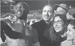  ?? KYNAN MARLIN/THE REPUBLIC ?? Phoenix RisingFC’s Didier Drogba takes a selfie with fans after the team’s 4-2 playoff win against the Swope Park Rangers on Friday.