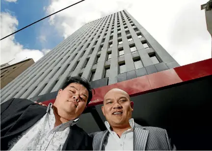  ?? PHOTO: ROSS GIBLIN/STUFF ?? John Chow, left, and Michael Chow want to buy, take over or create IT companies.