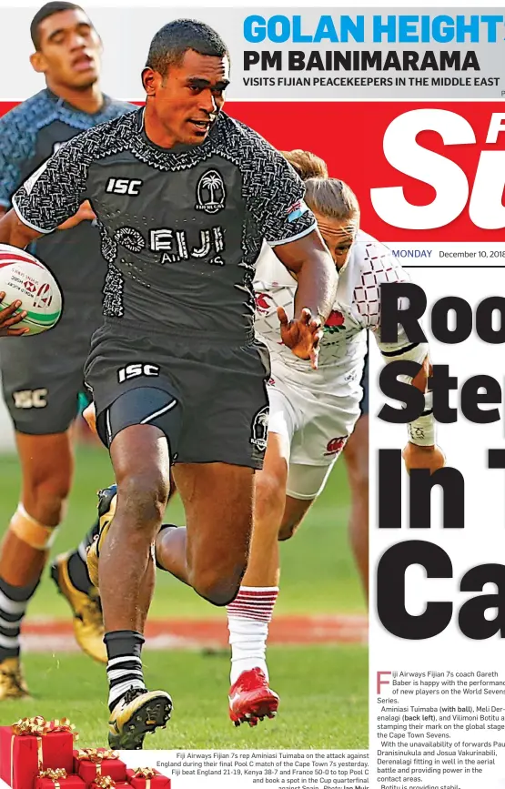  ?? Photo: Ian Muir ?? Fiji Airways Fijian 7s rep Aminiasi Tuimaba on the attack against England during their final Pool C match of the Cape Town 7s yesterday. Fiji beat England 21-19, Kenya 38-7 and France 50-0 to top Pool C and book a spot in the Cup quarterfin­al against Spain.