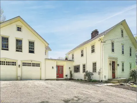  ?? Modern Angles photo ?? This c. 1771 Colonial sits on over three acres with pond and gardens and has been beautifull­y preserved and expanded to honor the past while affording modern comfort.