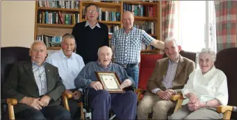  ??  ?? Seana Ghael officials made a special presentati­on to Matt Banville of Camross G.A.A. club recently to mark his 91st birthday. Matt, now a resident in Cleary Grove nursing home, is a member of that sporting Gaelic family of the Banvilles of Barry’s...