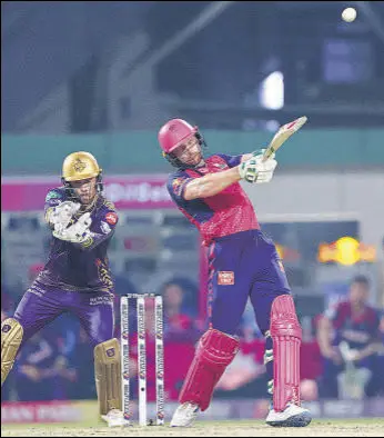  ?? BCCI ?? RR’S Jos Buttler hits a six in the last over to help his team chase down a target of 224 against KKR.