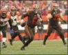  ?? TIM PHILLIS — FOR THE NEWS-HERALD ?? Baker Mayfield looks downfield during the Browns’ victory over the Bengals on Dec. 23 at FirstEnerg­y Stadium.