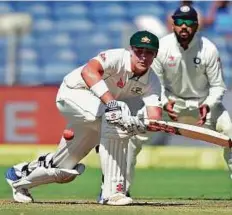  ?? PTI ?? Australia’s Matthew Renshaw in action during the first day of the first Test against India yesterday.