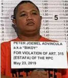  ??  ?? ARRESTED Peter Joemel Advincula, who says he is “Bikoy,” the hooded man in the narcovideo­s, has his picture taken during booking at PNP headquarte­rs on Thursday. He has been arrested for estafa.