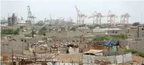  ?? - Reuters file photo ?? STRATEGIC PORT: Hodeidah port’s cranes is pictured from a nearby town in Hodeidah, Yemen.