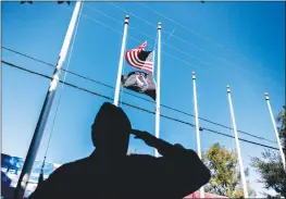  ?? Cory Rubin/The Signal ?? A veteran salutes the flag at the Veterans Day ceremonies at Veterans Historical Plaza in Newhall Sunday morning. For more Veterans Day coverage, see A7.