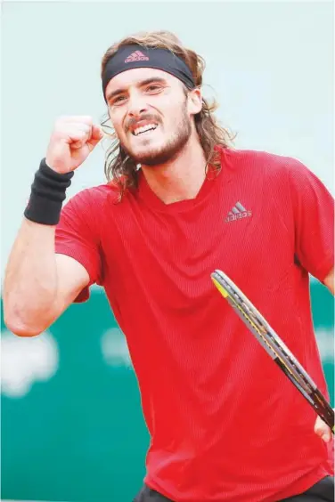  ?? Associated Press ?? Stefanos Tsitsipas celebrates after defeating Daniel Evans in their semifinal match of the Monte Carlo Masters in Monaco on Saturday.