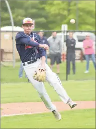  ?? John Nash/Hearst Media Connecticu­t / ?? Brien McMahon third baseman Pierce Hingtgen goes airborne while firing the ball across the diamond on a slow roller against Wilton on Friday.