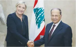  ?? (Reuters) ?? FRENCH NATIONAL PARTY leader Marine Le Pen is welcomed yesterday to Lebanon by President Michel Aoun at the Baabda presidenti­al palace.