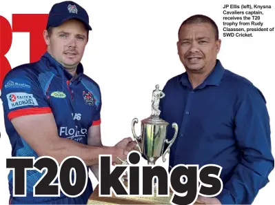  ?? ?? JP Ellis (left), Knysna Cavaliers captain, receives the T20 trophy from Rudy Claassen, president of SWD Cricket.