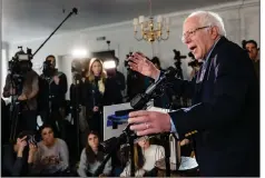  ?? (The New York Times/Jacob Hannah) ?? “What this campaign, I think, is increasing­ly about is, ‘which side are you on?’” Bernie Sanders said at a news conference Wednesday in Burlington, Vt.