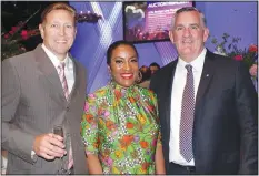  ?? NWA Democrat-Gazette/CARIN SCHOPPMEYE­R ?? Aaron Piotter, E&J Gallo Winemaker, North Coast Operations (from left); Latriece Watkins, Winemaker’s Dinner honorary chairwoman; and Joe Farnan, event chairman, welcome guests to the Walton Arts Center benefit May 16.