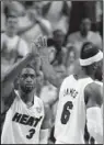  ?? AP/LYNNE SLADKY ?? Dwyane Wade had 25 points and LeBron James finished with 29 to help lead the Miami Heat in a 91-85 victory against the Oklahoma City Thunder in Game 3 of the NBA Finals.