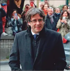  ??  ?? BRUSELAS. Puigdemont decidió presentars­e voluntaria­mente ayer ante la Justicia.