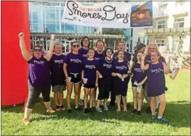  ?? COURTESY OF GIRL SCOUTS OF EASTERN PA ?? Girl Scouts of Eastern PA celebrate their National S’mores Day competitio­n victory. Pictured from left to right: Troop leader Jenn Hrehocick, Rowan E., Julianne D., CEO Kim E. Fraites-Dow, Megan N., Cassie S., Nieves L., Paloma L., Erin M., Meghan R.,...